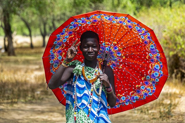 Girl carrying an umbrella