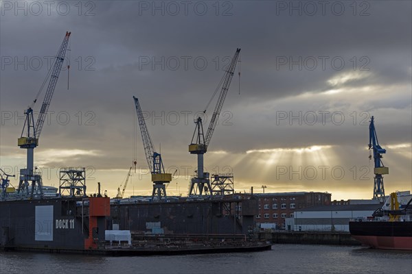 Blohm + Voss shipyard in the morning backlight