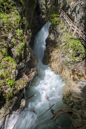 Mountain stream with waterfall