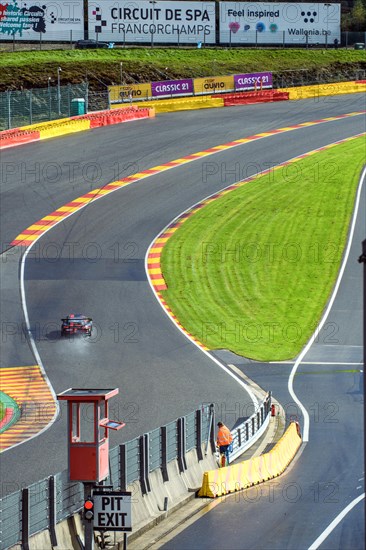 Porsche 911 GT3 Cup enters corner Eau Rouge