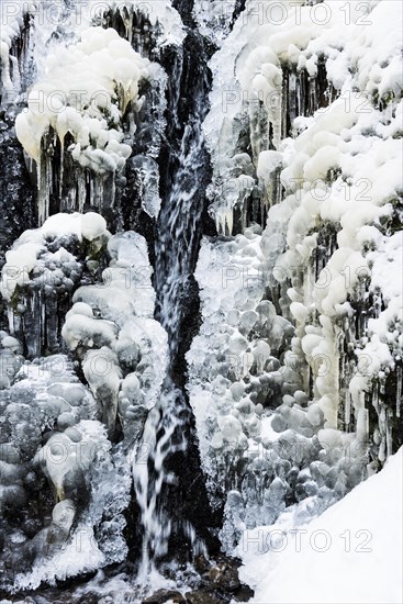 Waterfall with snow and ice