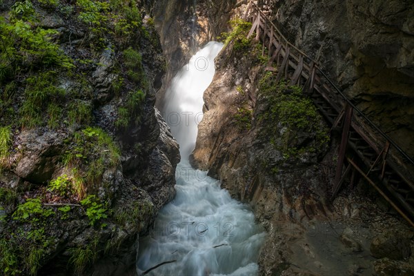 Mountain stream with waterfall