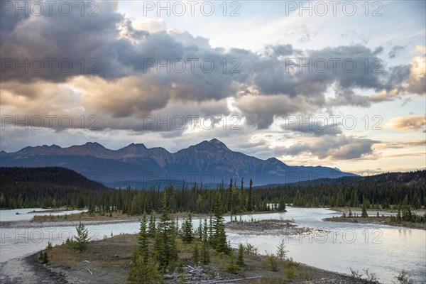 View of a valley with river in evening mood