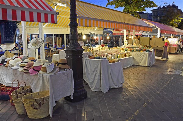 Evening hustle and bustle with restaurants and market stalls on the Cours Saleya