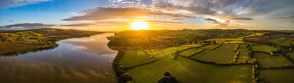 Panorama of Sunrise over Fields and River Teign from a drone