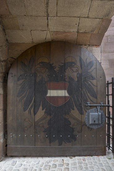 The double-headed eagle on the medieval gate of the Kaiserburg