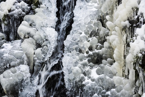 Waterfall with snow and ice