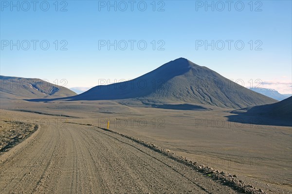 Rough track and barren mountains