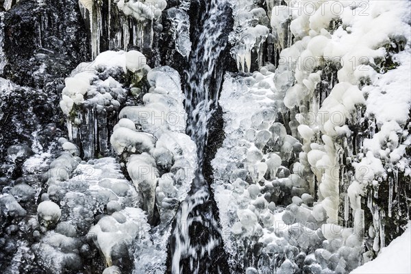 Waterfall with snow and ice