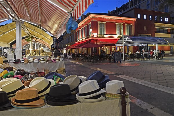 Evening hustle and bustle with restaurants and market stalls on the Cours Saleya