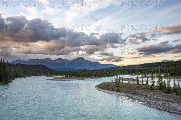 View of a valley with river in evening mood