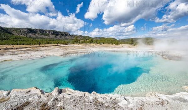 Turquoise clear water of a hot spring