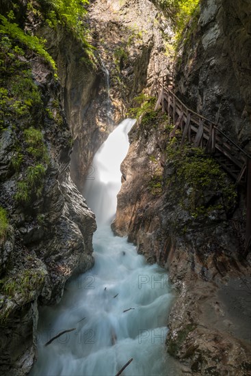 Mountain stream with waterfall