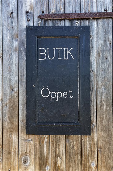 Sign with inscription Butik Oeppet