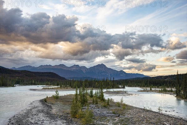 View of a valley with river in evening mood