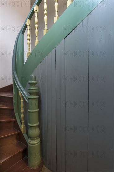 Staircase with banister of the 1920s in a residential house