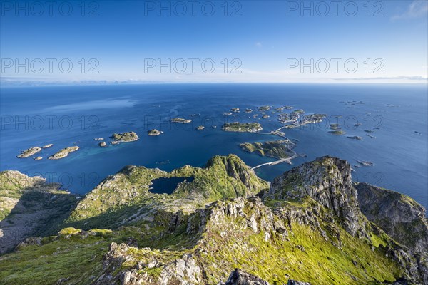 View of fishing village Henningsvaer from the top of Festvagtinden