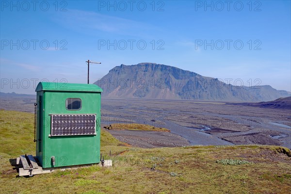 Green cottage with solar panels