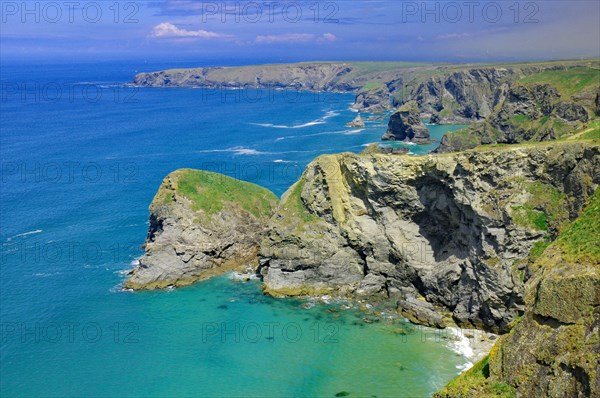 Rocks and cliffs in shallow water