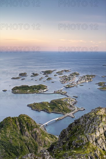 View of fishing village Henningsvaer from the top of Festvagtinden