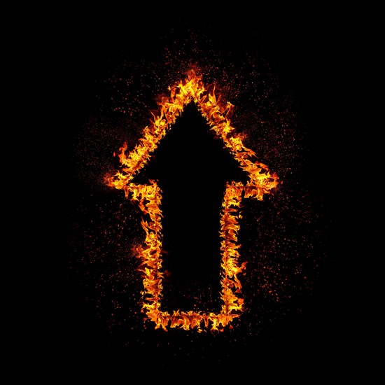 Flaming arrow grow up isolated on black background