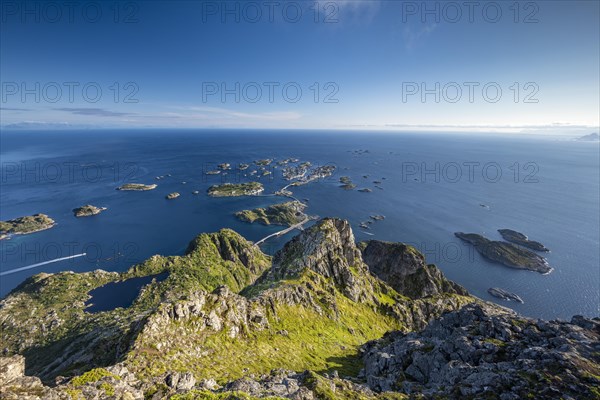 View of fishing village Henningsvaer from the top of Festvagtinden