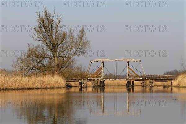 Historic wooden drawbridge over the Trebel near Nehringen