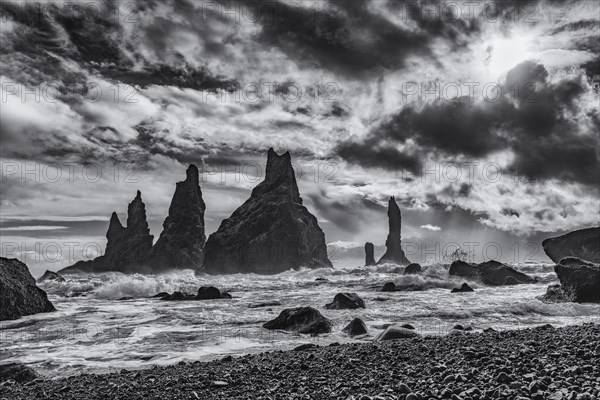 Lava rocks and rock needles on the black lava beach Reynisfjara