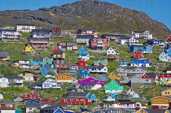 Colourful wooden houses on a mountainside