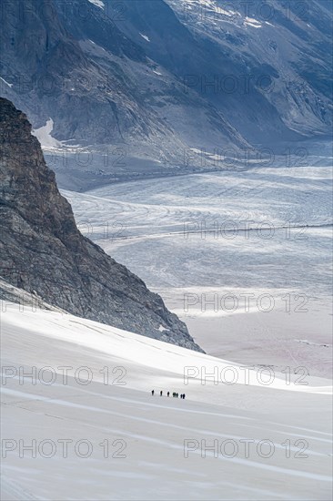 Hikers on the Aletsch Glacier from the Jungfraujoch