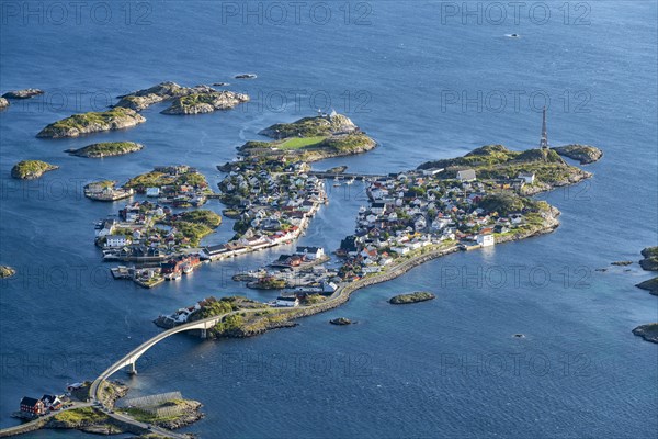 View of fishing village Henningsvaer from the top of Festvagtinden