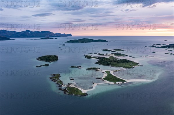 View of small islands in the sea near Sommaroy