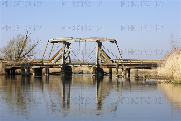 Historic wooden drawbridge over the Trebel near Nehringen