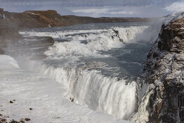 Gullfoss waterfall with ice and snow in winter