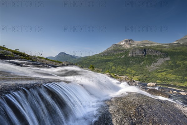 Waterfall flowing in Innerdalen High Valley