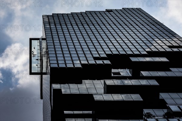 People standing on the glass floor of Maha Nakhon Tower