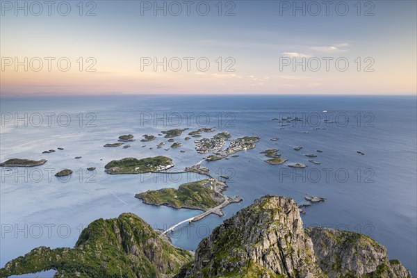 View of fishing village Henningsvaer from the top of Festvagtinden