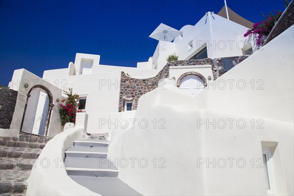 Staircase to hotel with an inner courtyard in Imerovigli