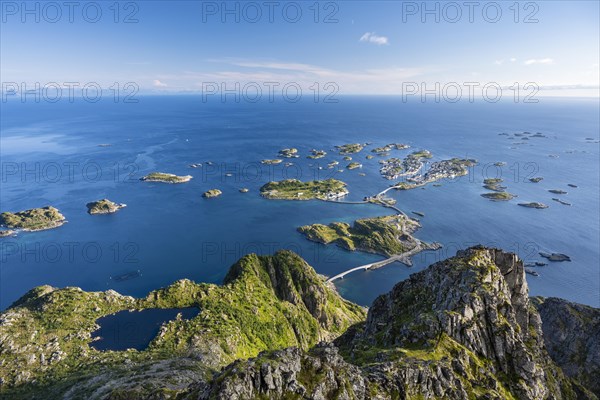 View of fishing village Henningsvaer from the top of Festvagtinden