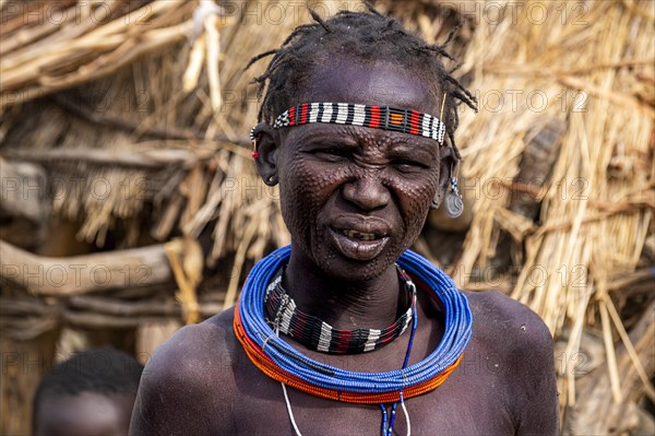 Scar face as a mark of beauty woman from the Jiye tribe