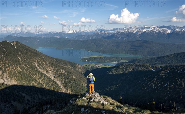 Hiker looking at mountain panorama