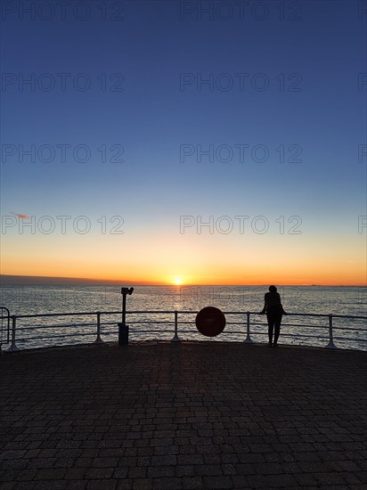 Visitors on Seafront Promenade