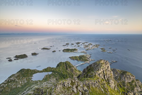 View of fishing village Henningsvaer from the top of Festvagtinden