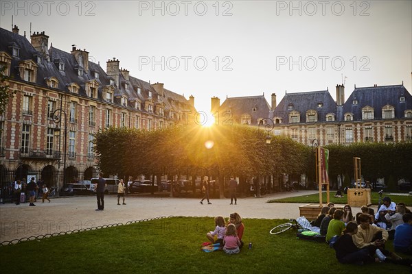 Evening atmosphere with fountains in front of medieval facades