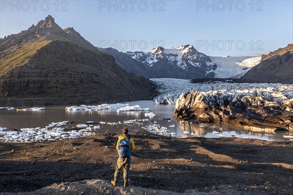 Glacial river in front of Mountains with Hvannadalshnukur