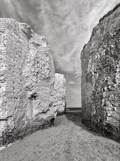 Chalk cliffs with passage to the sea