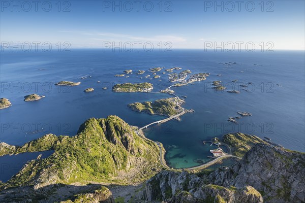 View of fishing village Henningsvaer from the top of Festvagtinden