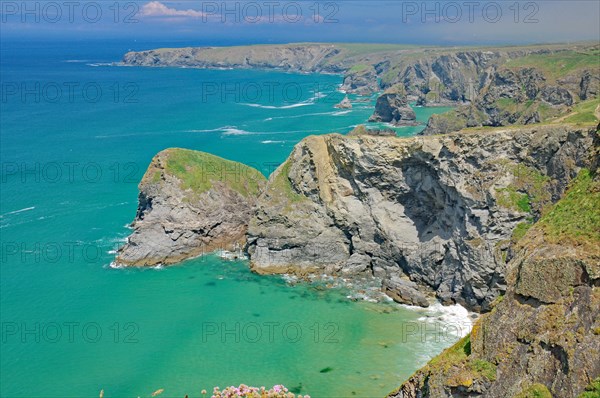 Rocks and cliffs in shallow water