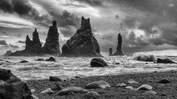 Lava rocks and rock needles on the black lava beach Reynisfjara