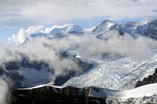 Snow-capped mountains and flowing glaciers